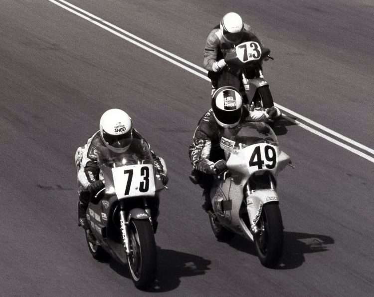 Controversial finish in the combined National Pro and Amateur Formula Two event at Race City in Calgary, Alberta, August, 1988: Steve Crevier surges into the Pro lead on his Pacific Yamaha TZ250 # 73, while Jon Cornwell is already showing his anger aboard the Brutune Spondon-Rotax twin # 49. In the back ground, top Amateur F II racer Dr. Rick Inman, on a four-stroke single Brutune built Spondon-Rotax, stays well wide on the drag strip front straight. Inman was a big supporter of Cornwell and the 250 Grand prix category in general. CREDIT: Colin Fraser / CSBK