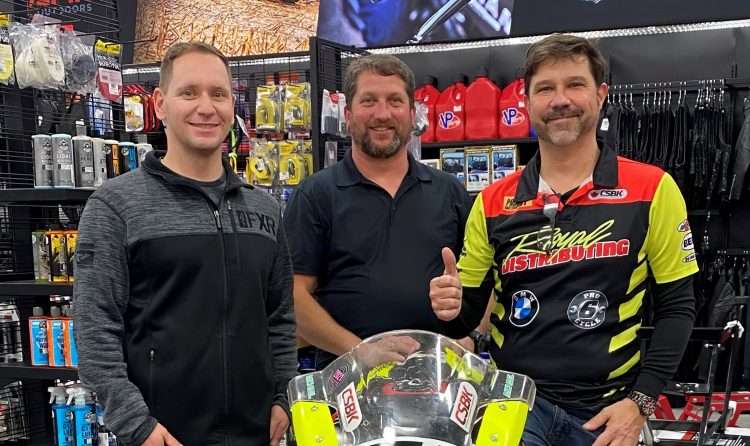 1.	At the recent opening of the Kanata Royal Distributing store, CEO Jordan Smart and President Scott Spark join their CSBK Pro Superbike racer, Michael Leon. CREDIT: CSBK.ca